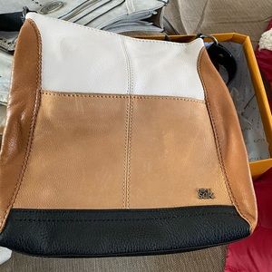 Saks Lucia Leather multi color purse Never Used
